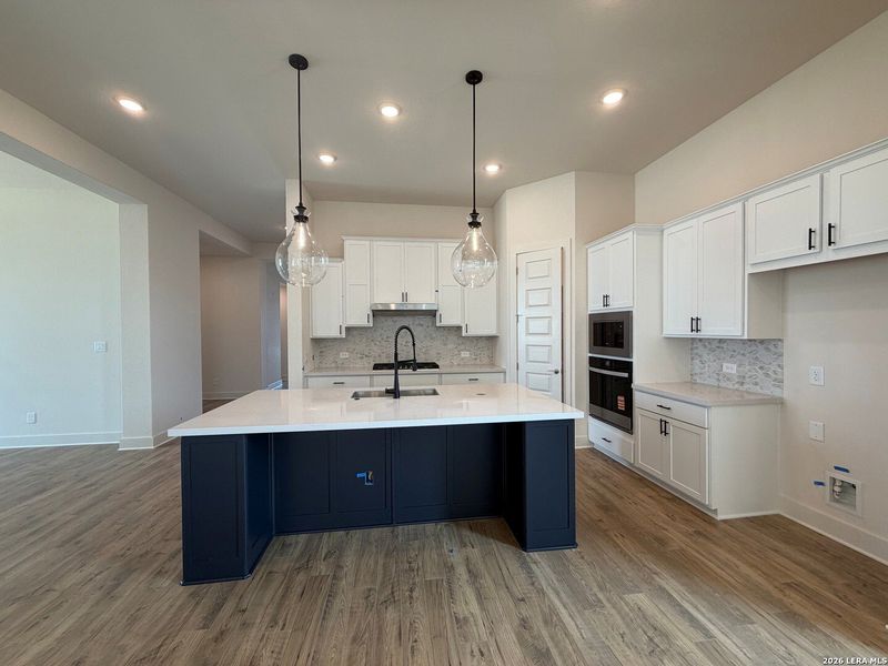 Furnished interior view inside a new home in Ladera - 50s, San Antonio (Image 6).