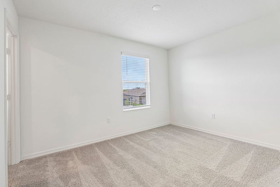 Spacious, unfurnished interior of a new home in Reserve at Forest Lake Townhomes, Lake Wales (Image 19).