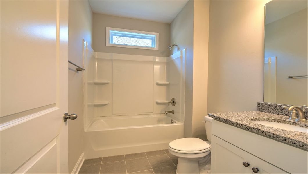 Representative furnished interior of a home built from the ARLINGTON DRHe by D.R. Horton in Valley View, Waynesville (Image 12).