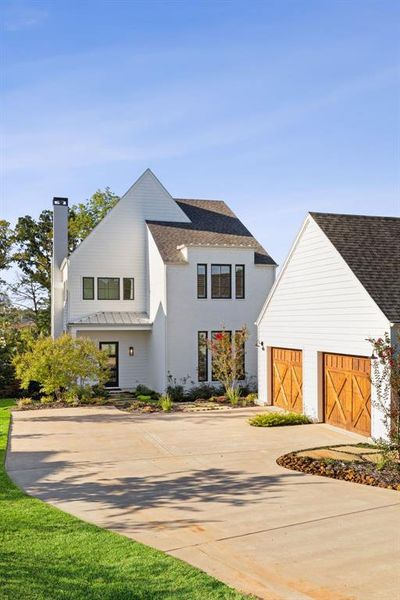 Front exterior of a new home in , Malakoff, TX, highlighting curb appeal (Image 21). Front exterior of a new home in , Malakoff, TX, highlighting curb appeal (Image 21).