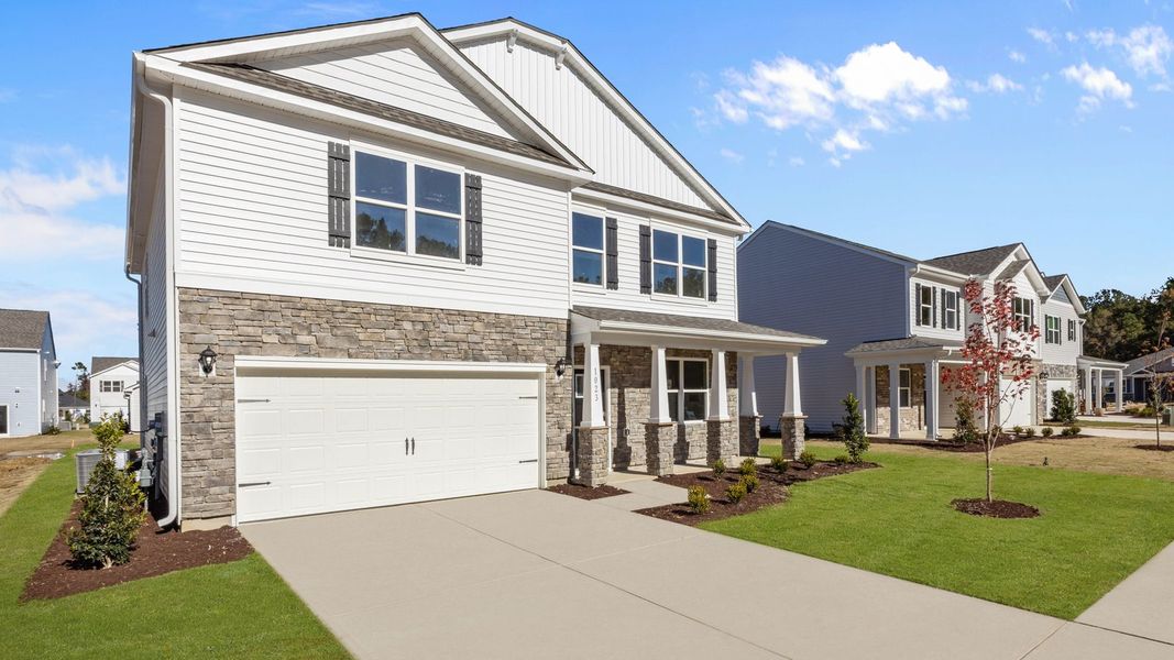 Front exterior of a new home in West New Bern, New Bern, NC, highlighting curb appeal (Image 2). Front exterior of a new home in West New Bern, New Bern, NC, highlighting curb appeal (Image 2).
