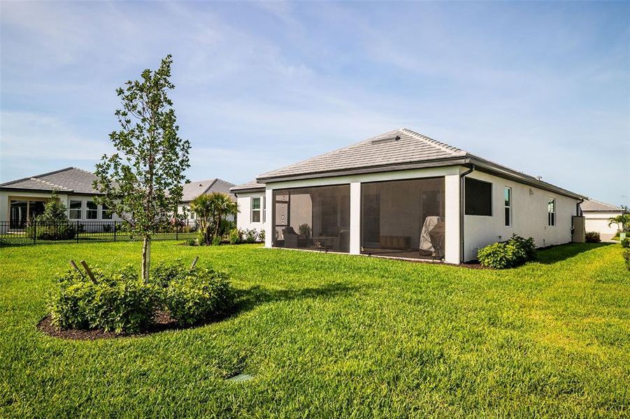 Exterior details and patio area of a home in Sweetwater at Lakewood Ranch, Bradenton (Image 29).