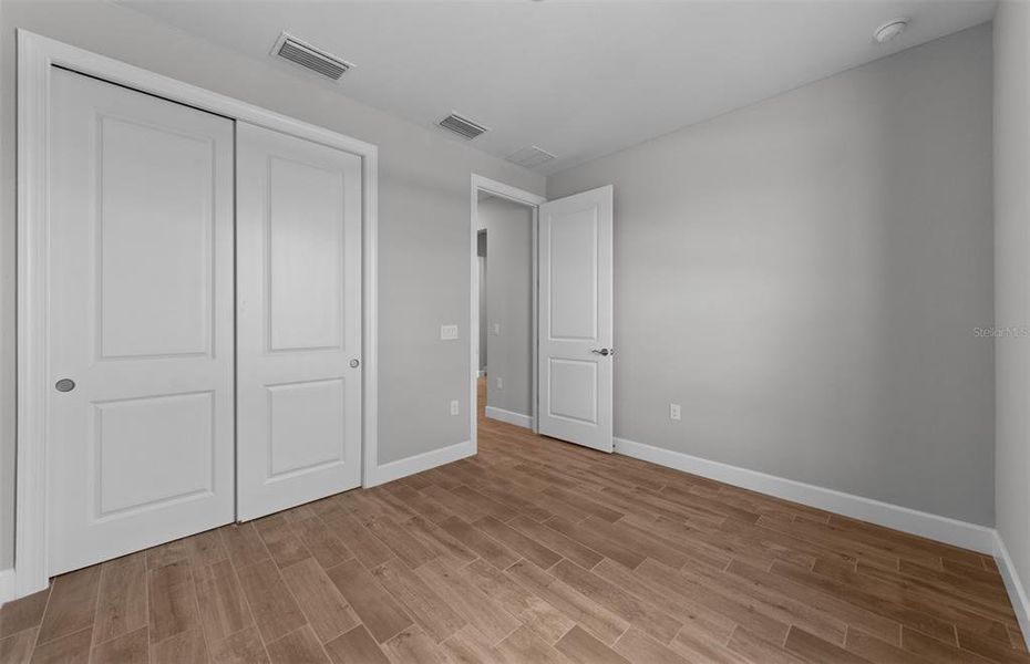 Spacious, unfurnished interior of a new home in Arbor Oaks, North Port (Image 11). Spacious, unfurnished interior of a new home in Arbor Oaks, North Port (Image 11).