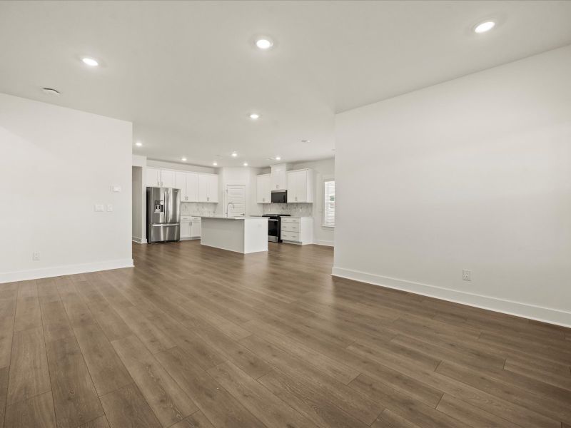 Spacious, unfurnished interior of a new home in The Coves at Lakes of Cane Bay, Summerville (Image 17).