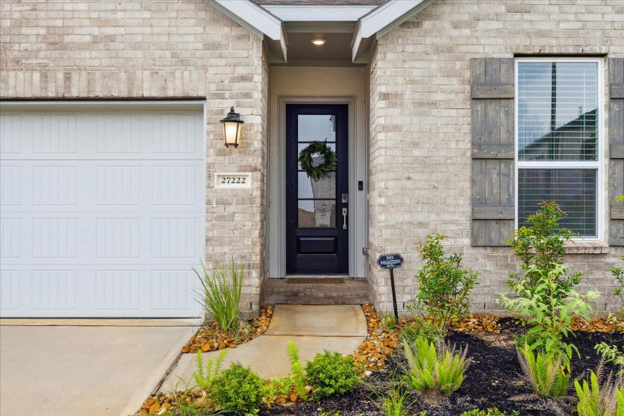 Front exterior of a new home in , Hockley, TX, highlighting curb appeal (Image 1).