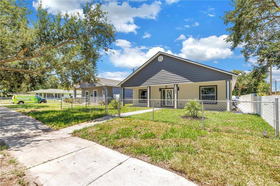 Front exterior of a new home in , St. Petersburg, FL, highlighting curb appeal (Image 19).