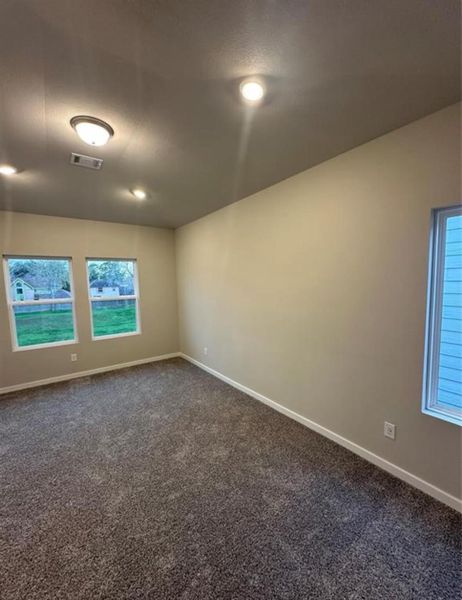 Spacious, unfurnished interior of a new home in McClendon Park Village, Houston (Image 11).