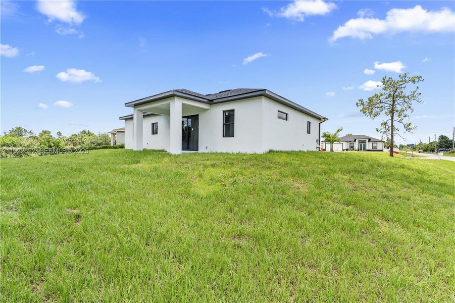 Exterior details and patio area of a home in , Lehigh Acres (Image 23).