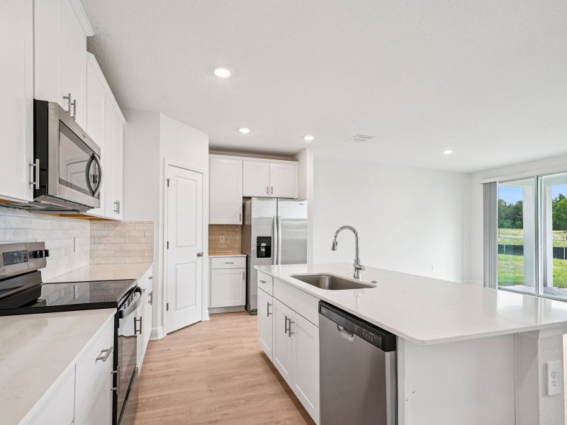 Furnished interior view inside a new home in The Reserve at Hammock Oaks - Signature Series, Lady Lake (Image 5).
