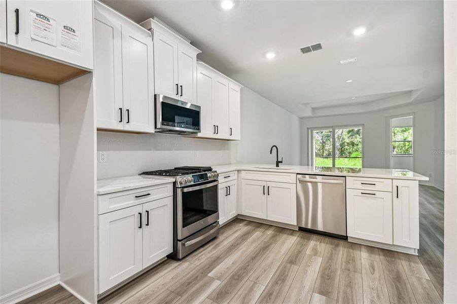 Furnished interior view inside a new home in Sweetwater at Lakewood Ranch, Lakewood Ranch (Image 4).