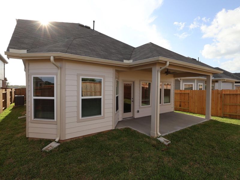 Front exterior of a new home in Summerview, Fulshear, TX, highlighting curb appeal (Image 9). Front exterior of a new home in Summerview, Fulshear, TX, highlighting curb appeal (Image 9).