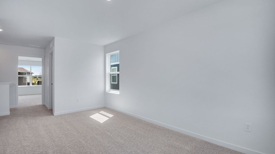 Spacious, unfurnished interior of a new home in Trails at Crowfoot, Parker (Image 36).
