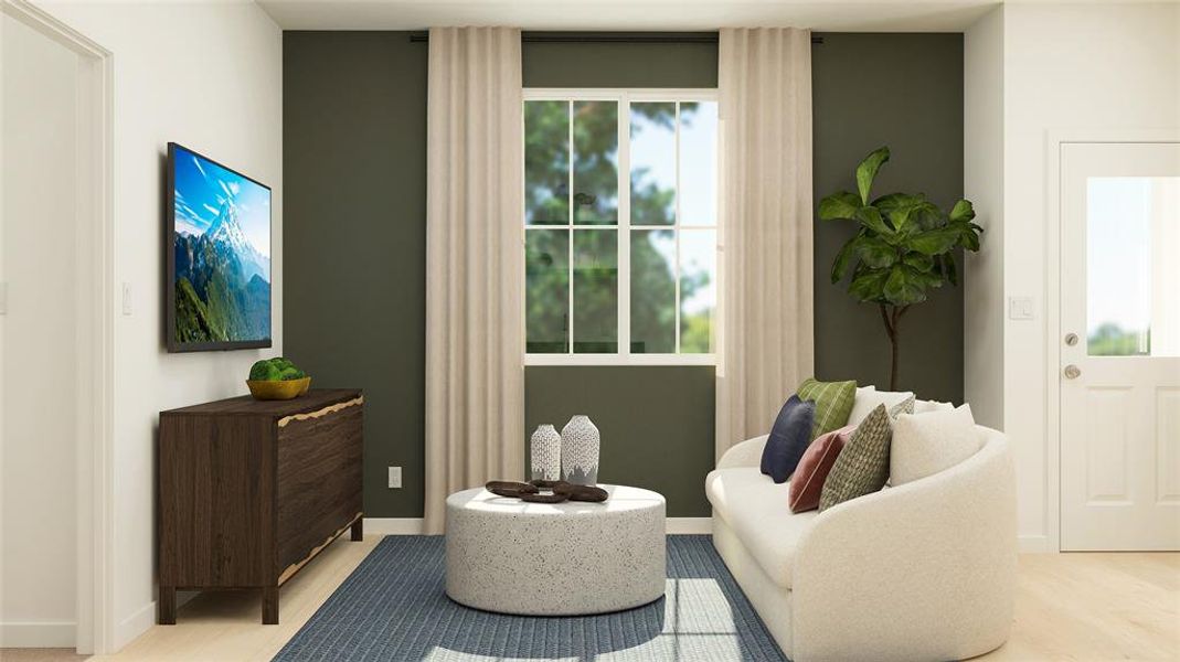 Sitting room with light wood-style flooring