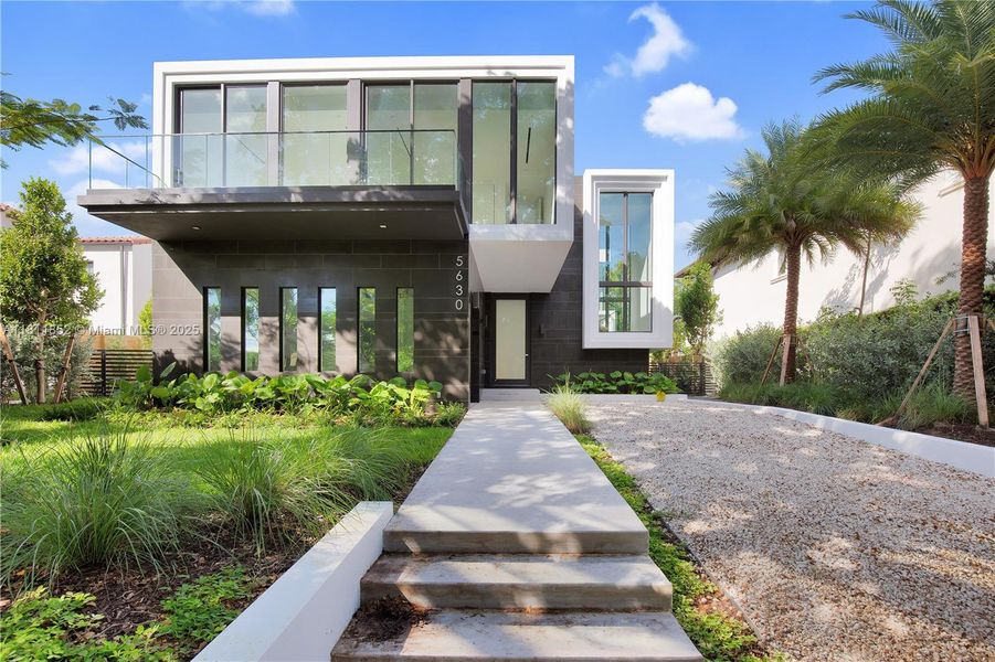 Front exterior of a new home in , Miami Beach, FL, highlighting curb appeal (Image 23). Front exterior of a new home in , Miami Beach, FL, highlighting curb appeal (Image 23).