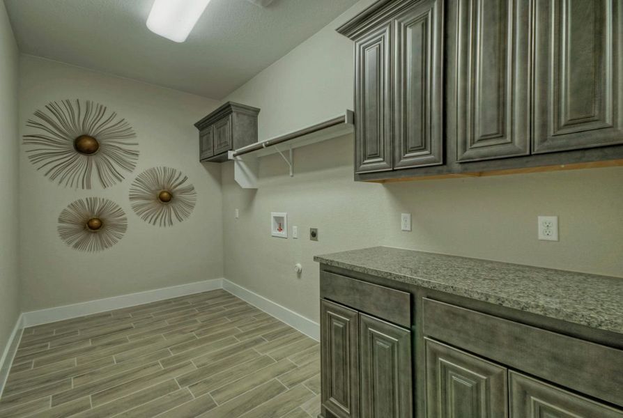 Representative furnished interior of a home built from the Madera II by Giddens Homes in Scofield Farms Estates, Georgetown (Image 160).