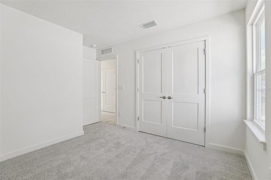 Spacious, unfurnished interior of a new home in Trinity Place, St. Cloud (Image 27).