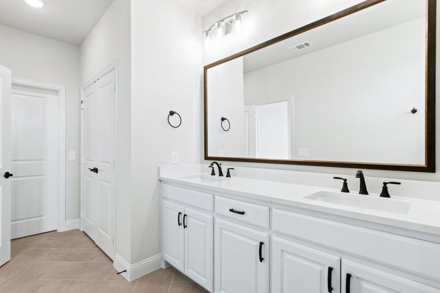 Furnished interior view inside a new home in The Tribute, The Colony (Image 18).