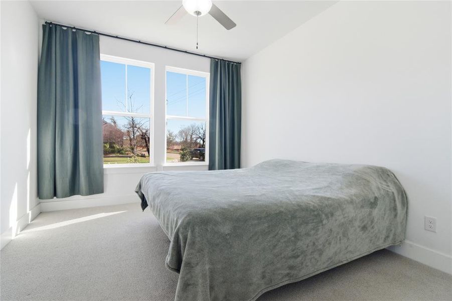 Furnished interior view inside a new home in , Hickory Creek (Image 9).