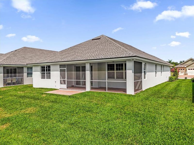 Front exterior of a new home in Lake James, Lakeland, FL, highlighting curb appeal (Image 16). Front exterior of a new home in Lake James, Lakeland, FL, highlighting curb appeal (Image 16).