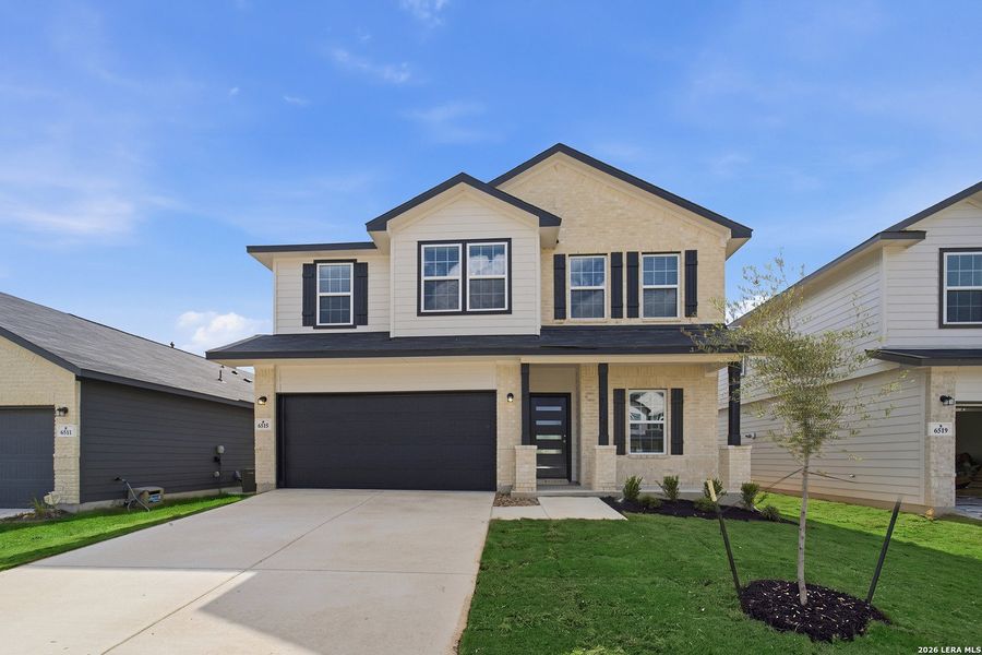 Front exterior of a new home in Morgan Meadows, San Antonio, TX, highlighting curb appeal (Image 19). Front exterior of a new home in Morgan Meadows, San Antonio, TX, highlighting curb appeal (Image 19).