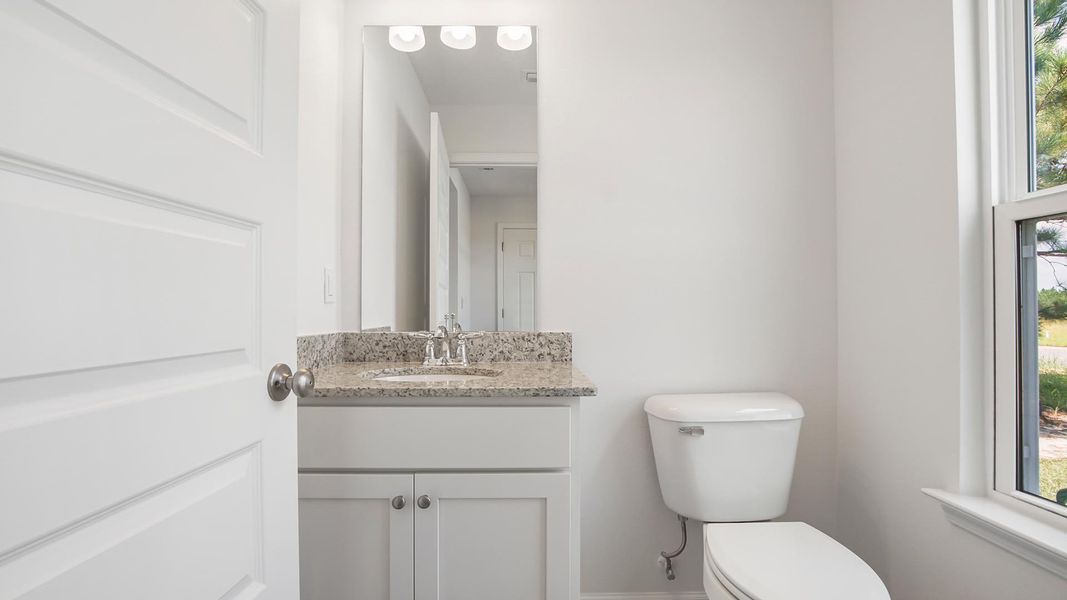 Furnished interior view inside a new home in Owl's Head East, Freeport (Image 4).