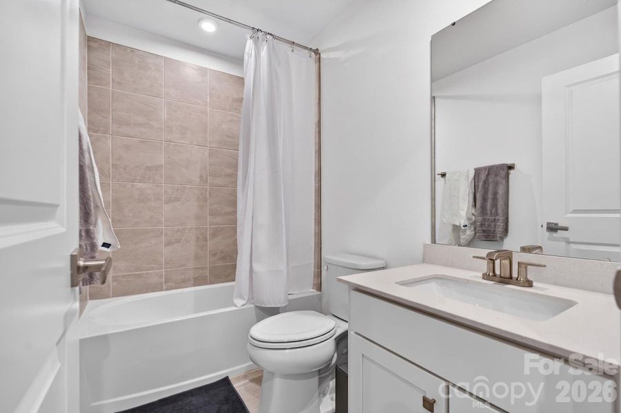 Full bathroom on lower level is great for guest