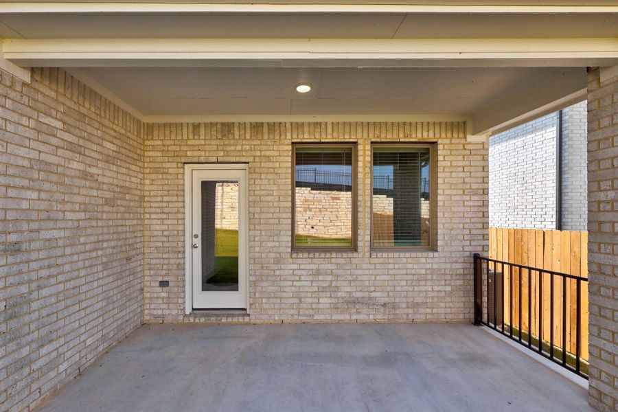 Covered Patio in the Elm home plan by Trophy Signature Homes – REPRESENTATIVE PHOTO Covered Patio in the Elm home plan by Trophy Signature Homes – REPRESENTATIVE PHOTO