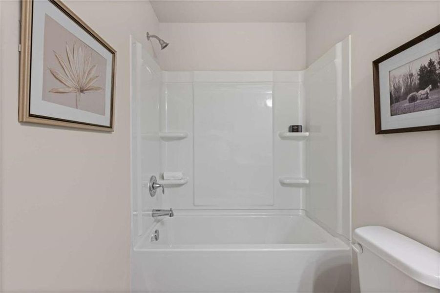 Furnished interior view inside a new home in Rivershire Place, Villa Rica (Image 38).