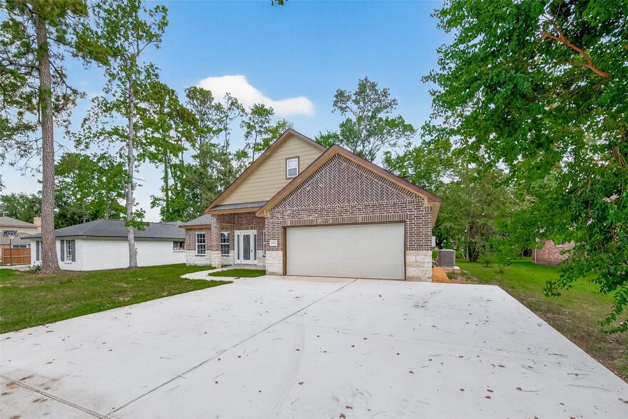 Front exterior of a new home in , Crosby, TX, highlighting curb appeal (Image 12).