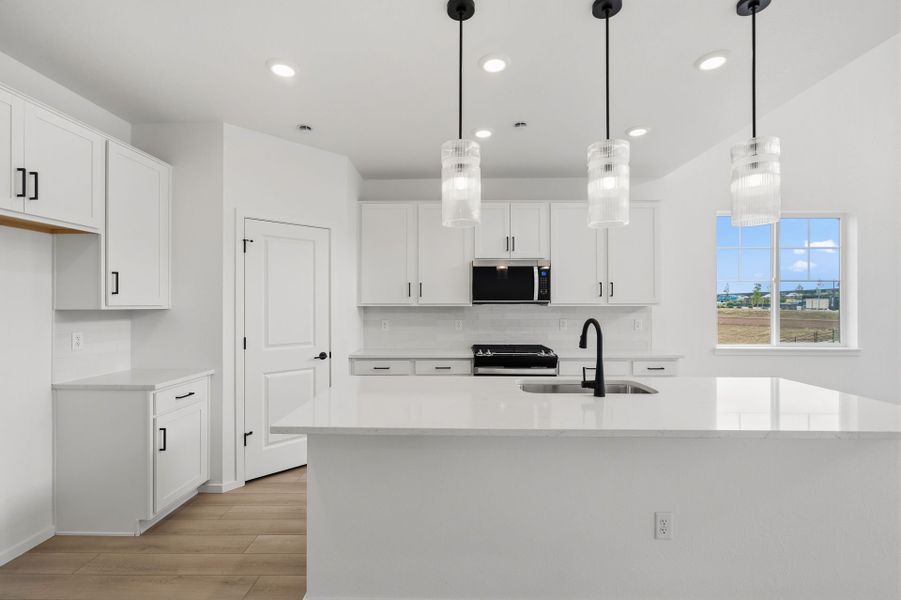 Furnished interior view inside a new home in Harvest Crossing, Aurora (Image 4).