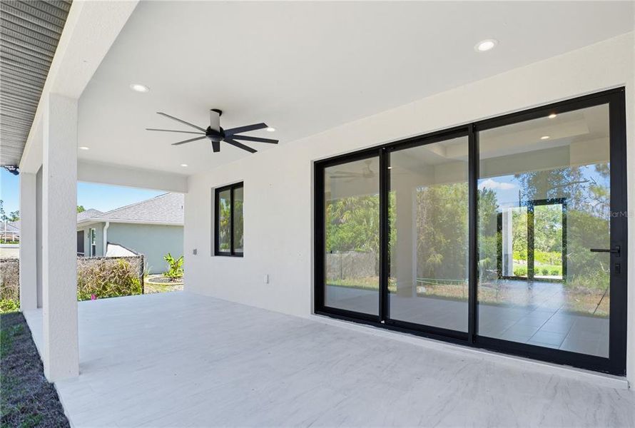Exterior details and patio area of a home in , North Port (Image 29).