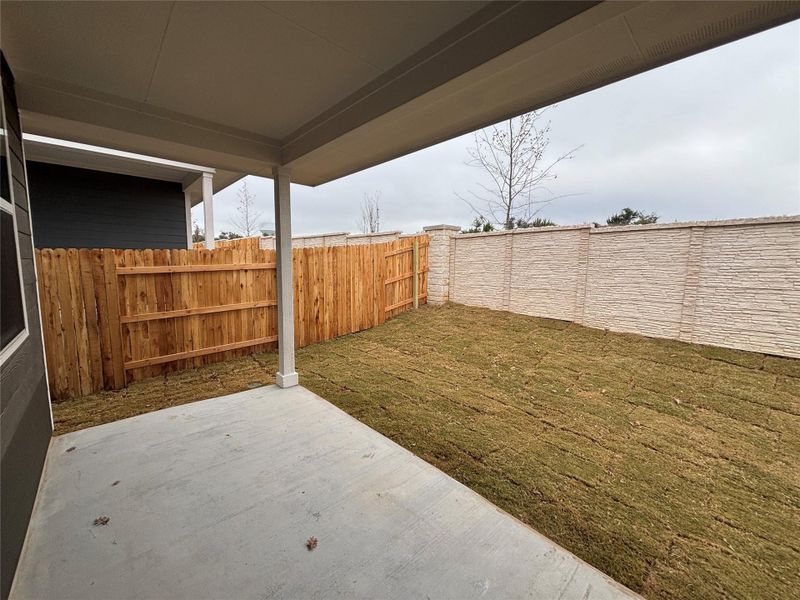 Exterior details and patio area of a home in Cannon Ranch 40s, Dripping Springs (Image 4).