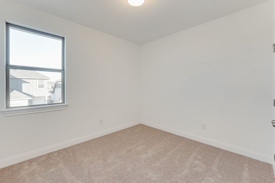 Spacious, unfurnished interior of a new home in The Porch at Du Pre, Buda (Image 10).