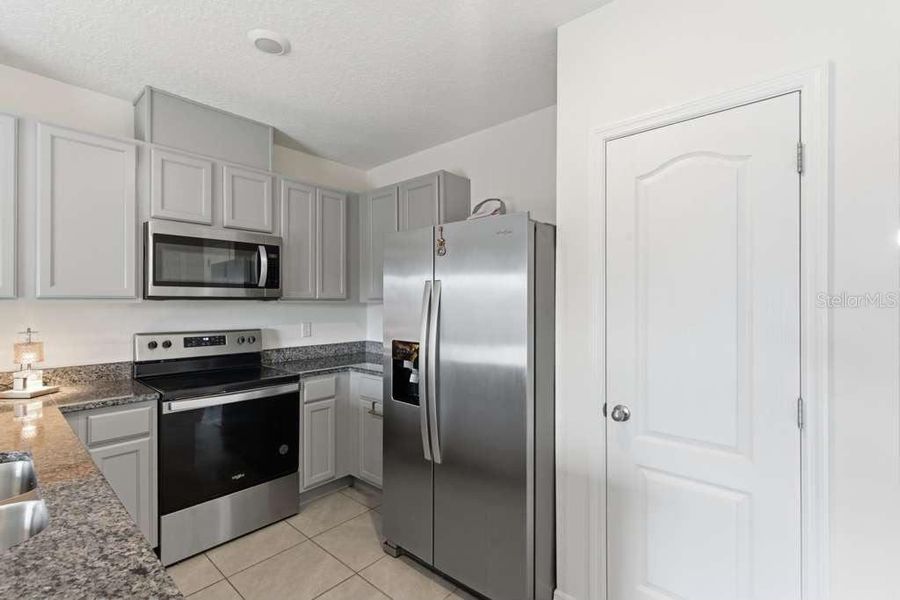Furnished interior view inside a new home in Brentwood, Davenport (Image 17).