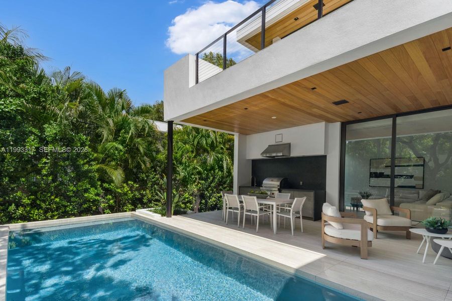 Exterior details and patio area of a home in , Miami (Image 3).