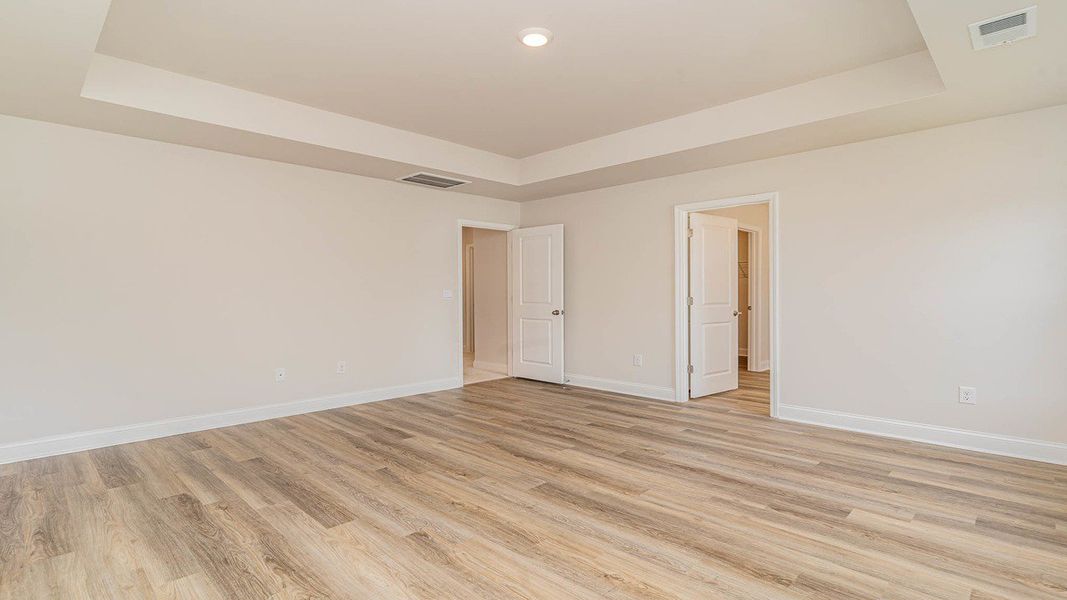 Representative unfurnished interior of a home built from the FORRESTER by D.R. Horton in Shell Pointe, Gilbert (Image 22).