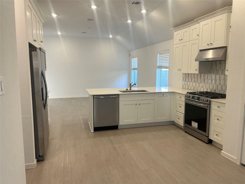 View of the large kitchenFrom breakfast room View of the large kitchenFrom breakfast room
