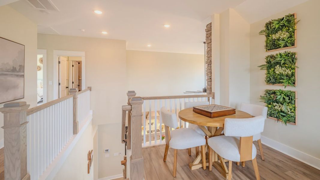 Spacious loft with hard surface flooring and bright natural lighting from windows Spacious loft with hard surface flooring and bright natural lighting from windows