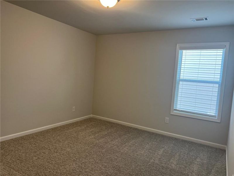 Spacious, unfurnished interior of a new home in Crofton Place Enclave, Snellville (Image 57).