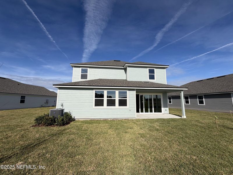 Exterior details and patio area of a home in , Flagler Beach (Image 22). Exterior details and patio area of a home in , Flagler Beach (Image 22).