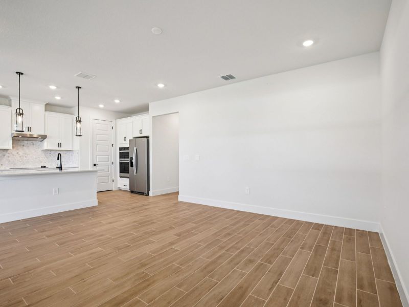 Spacious, unfurnished interior of a new home in Magnolia Bay - Reserve Series, Nokomis (Image 7).