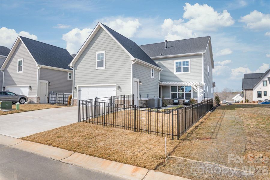 Front exterior of a new home in , Davidson, NC, highlighting curb appeal (Image 26).