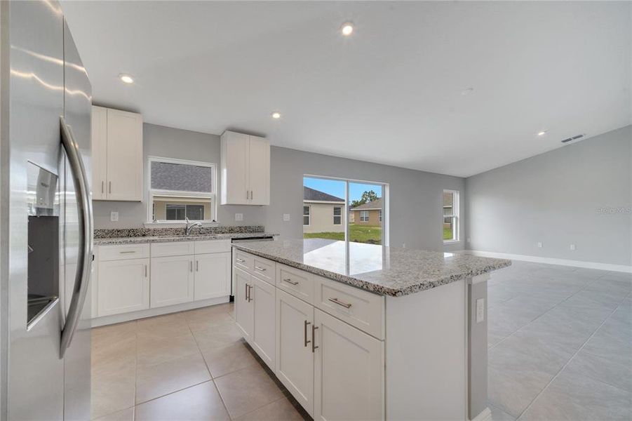 Furnished interior view inside a new home in , Kissimmee (Image 6).