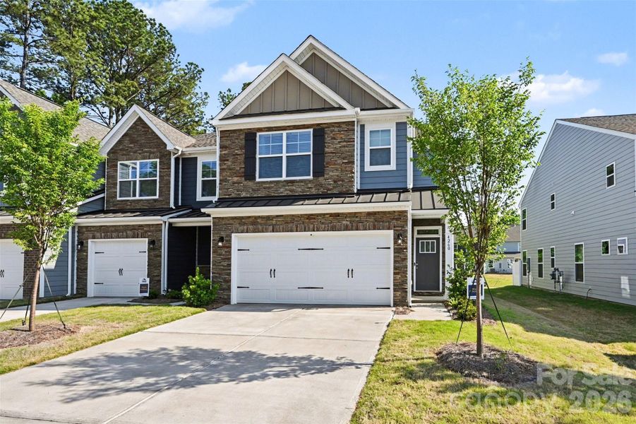 Front exterior of a new home in , Harrisburg, NC, highlighting curb appeal (Image 2). Front exterior of a new home in , Harrisburg, NC, highlighting curb appeal (Image 2).