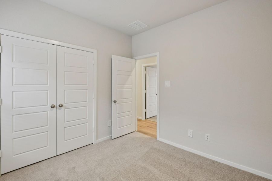 Spacious, unfurnished interior of a new home in Granger Pointe - Traditional Series, Conroe (Image 19).