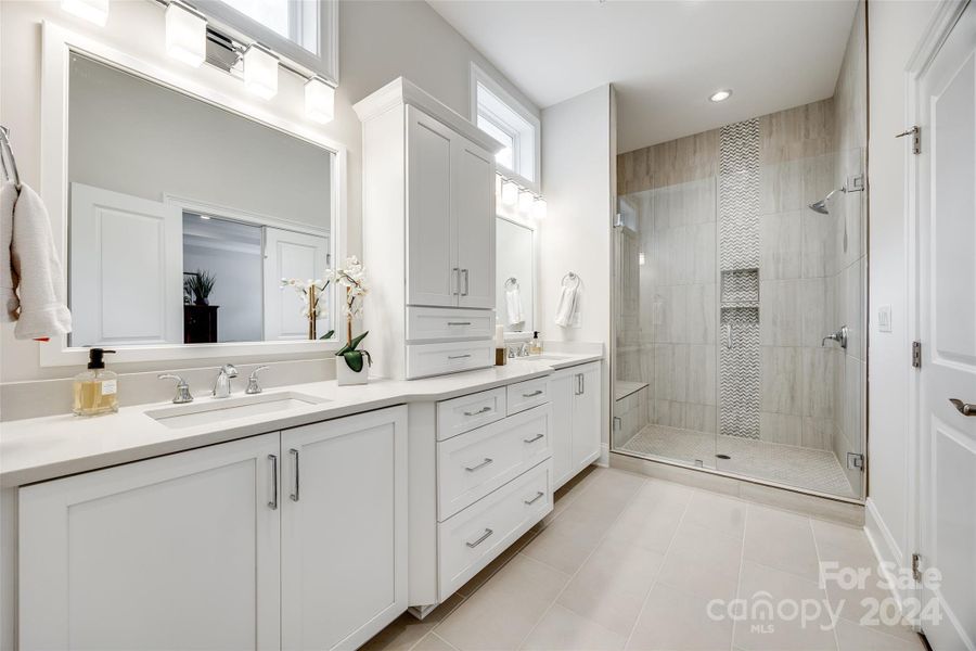 Spa-like primary bathroom with walk-in shower.