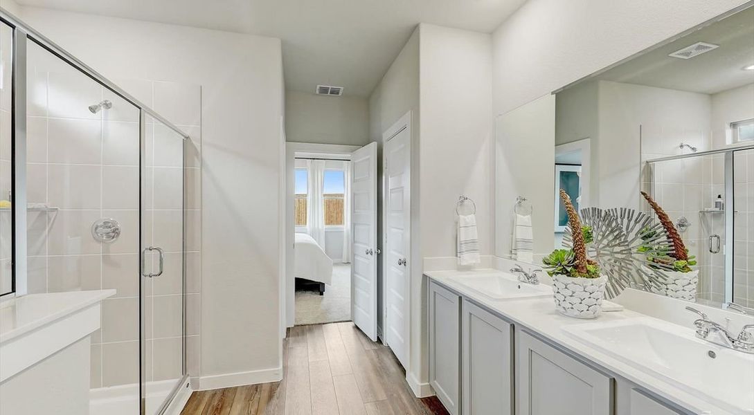 Primary bathroom in the Oak home plan by Trophy Signature Homes – REPRESENTATIVE PHOTO