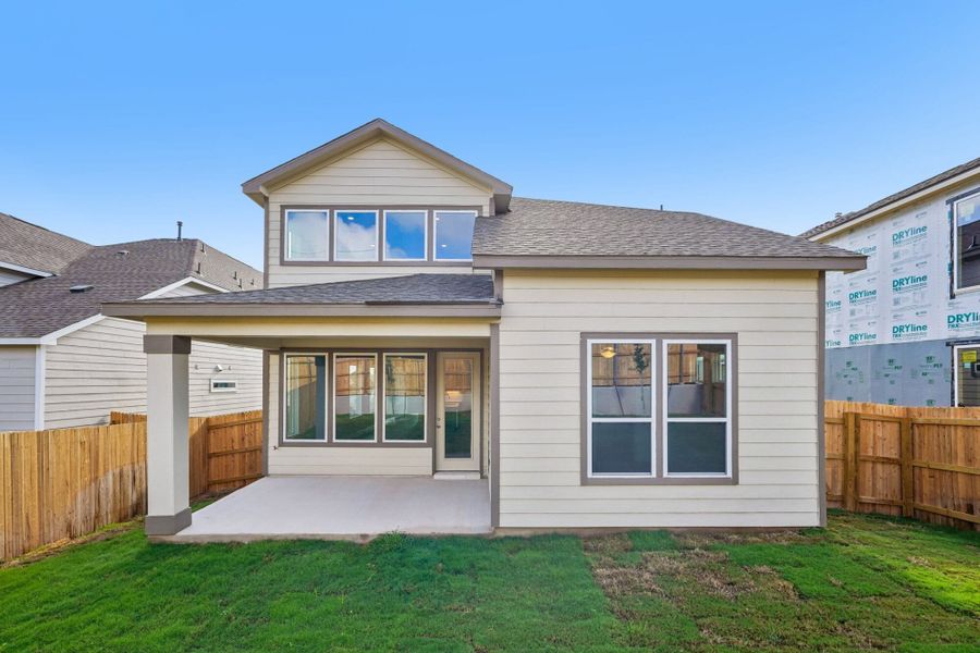 Exterior details and patio area of a home in The Meadows at Hunters Ranch, San Antonio (Image 4).