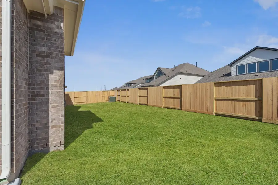 Representative exterior details of a home built from the Brentwood by Chesmar Homes in Meridiana 50's and 60's, Manvel (Image 3).