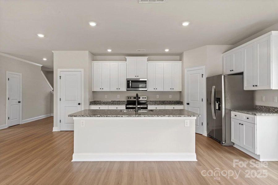 Furnished interior view inside a new home in Ascot Woods, Charlotte (Image 4).